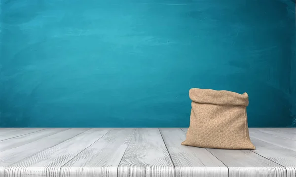3d renderização de um saco de dinheiro aberto feito de pano hessiano sem marcas de pé em uma mesa de madeira no fundo azul . — Fotografia de Stock