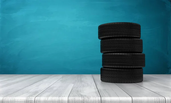 3d rendering of a car tires standing on a wooden surface in front of blue background. — Stock Photo, Image