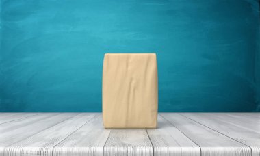 tek kapalı çimento torbası 3B oluşturmayı dikey bir ahşap masa mavi arka plan üzerine yerleştirilen.