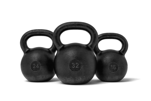 Üç siyah demir kettlebells işaretler 32, 24 ve 16 kg konumu birbirlerine yakın olan 3D render. — Stok fotoğraf