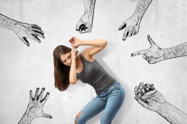 Young girl bending down covering her face with her hands trying to protect herself from mens fists, finger guns and hands pointing at her. clipart