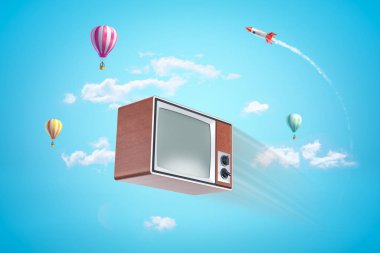 3d rendering of a vintage tv set with hot air balloons and space rocket on blue sky background