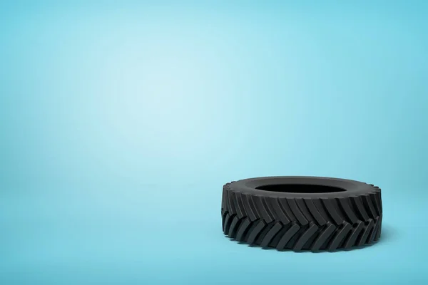 3d rendering of black wheel tyre on blue background