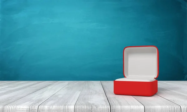 Rendement 3d de la boîte à anneaux rouge ouverte sur une table en bois près du mur bleu . — Photo