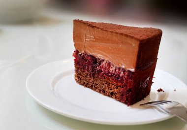 Photo of a sweet truffle cake in a cafe clipart