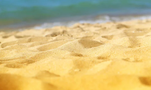 Bela textura de areia amarela — Fotografia de Stock