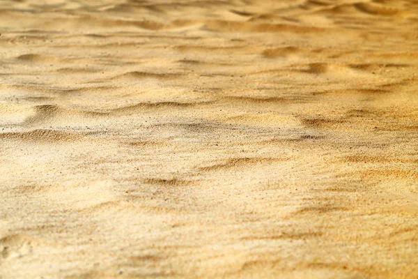 Beautiful texture of yellow sand — Stock Photo, Image