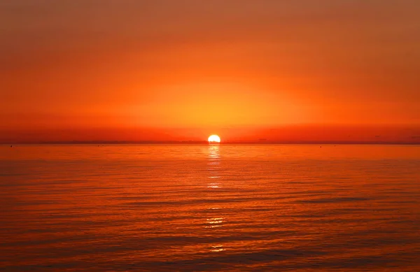 Foto av en ljusa havet solnedgång — Stockfoto