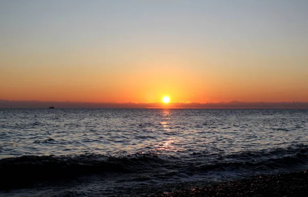 Foto av en ljusa havet solnedgång — Stockfoto