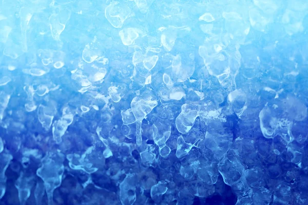 Foto Hintergrund von hellen Eiszapfen und Eisschollen — Stockfoto