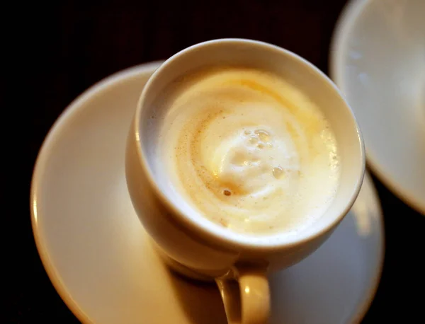 Foto macro delicioso café com leite — Fotografia de Stock