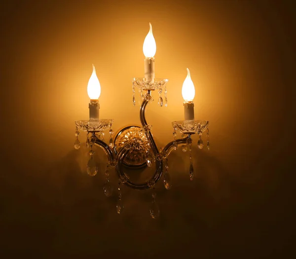 Fotografie makro lampy se svíčkami na stěně — Stock fotografie