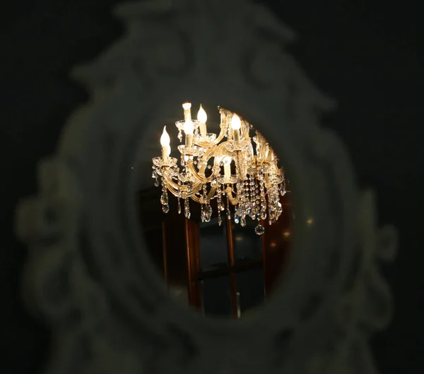 Fotografie makro lampy se svíčkami na stěně — Stock fotografie