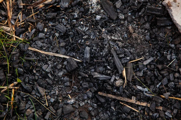 Coal and ashes after a fire and barbecue