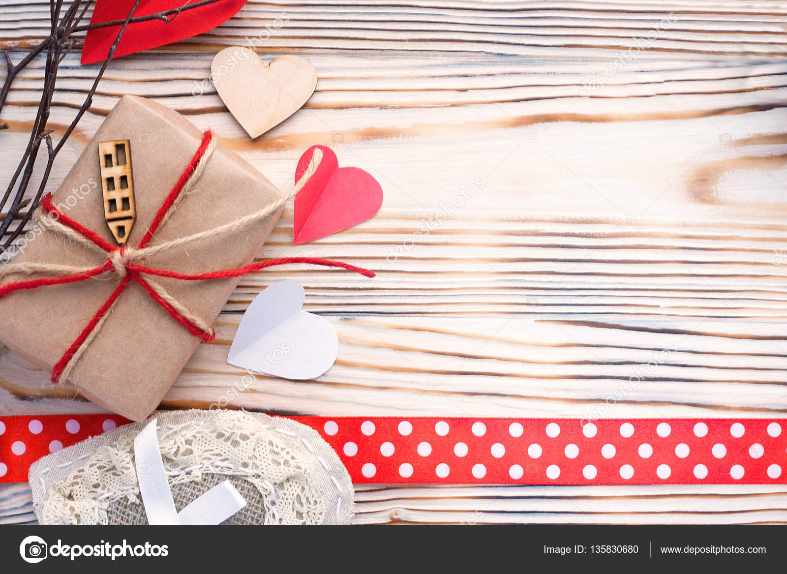 Eco pack Present with wooden hearts. Happy birthday love card background.  Stock Photo by ©valoshka 135830680