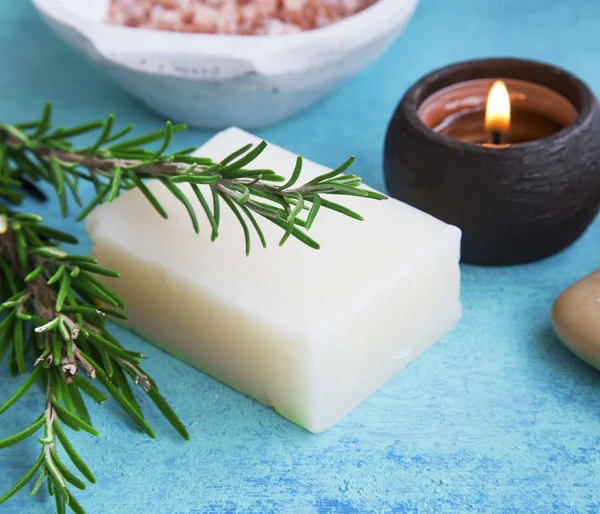 Herbal spa with rosemary soap, candle and herb — Stock Photo, Image