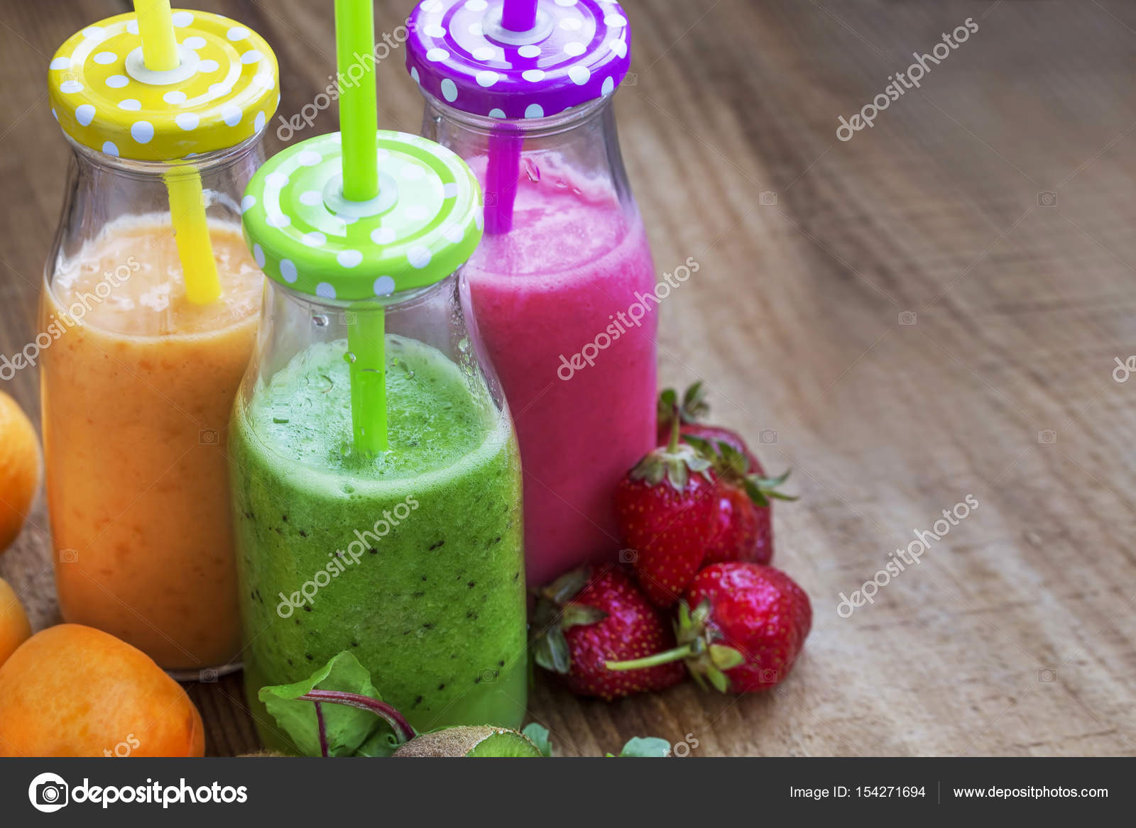 Bottles Of Healthy Fruit Juice Smoothie Stock Photo - Download
