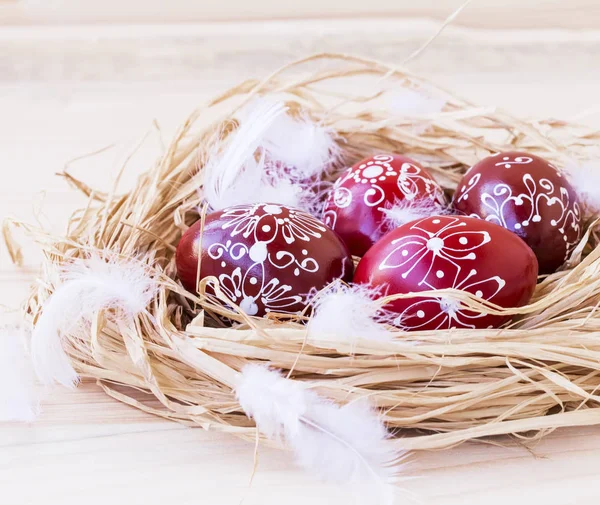 Easter eggs on a straw nest — Stock Photo, Image