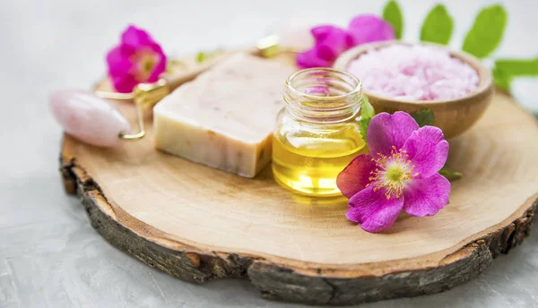 Spa skincare setting with oils and natural soap, rosehip oils an — Stock Photo, Image