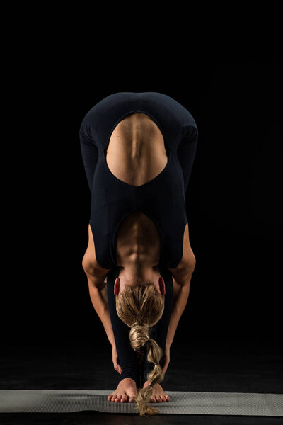 Woman standing in yoga position     