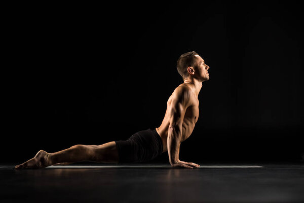 Man lying in yoga position