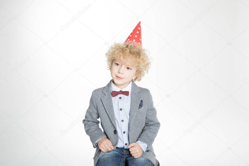 Boy in cone hat