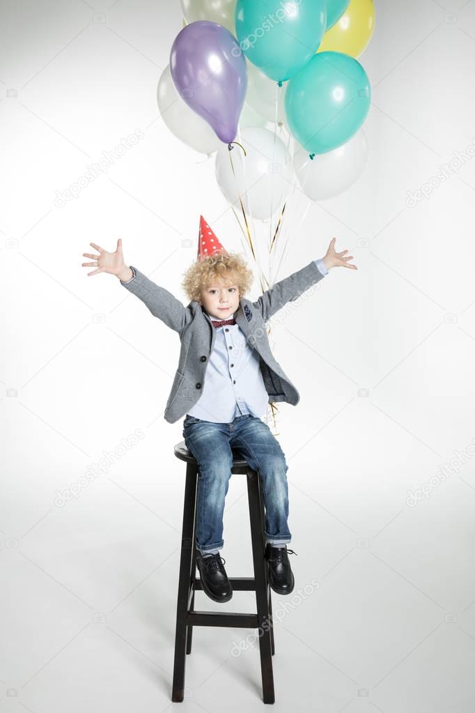 Boy with air balloons 