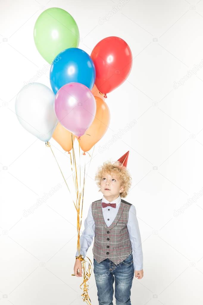 Boy with air balloons 