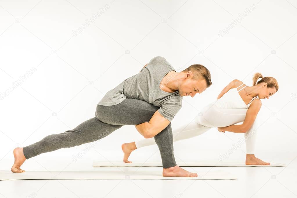 Couple practicing yoga