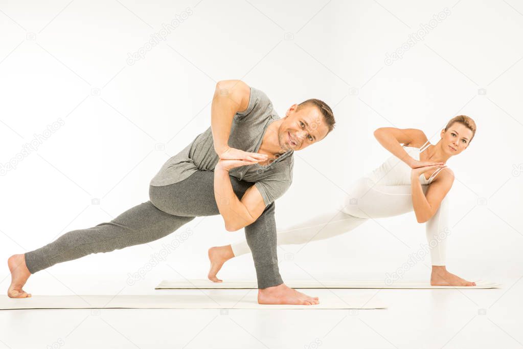 Couple practicing yoga