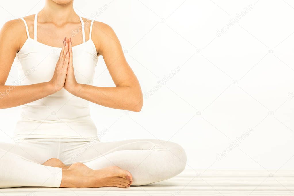 Woman sitting in lotus position