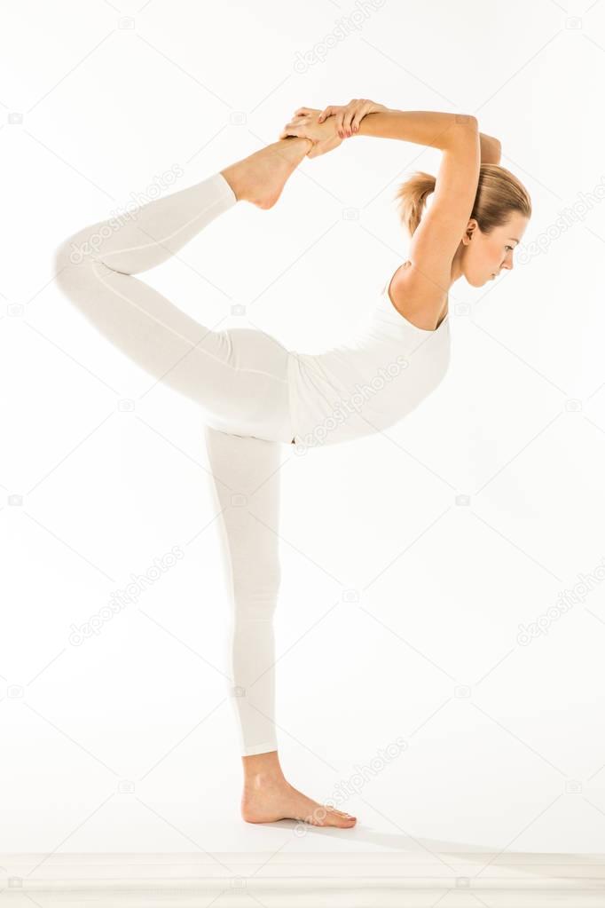 Woman standing in yoga pose 