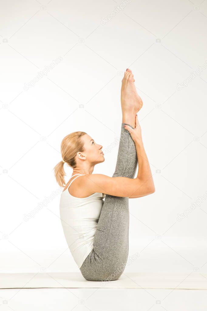 Woman practicing yoga   