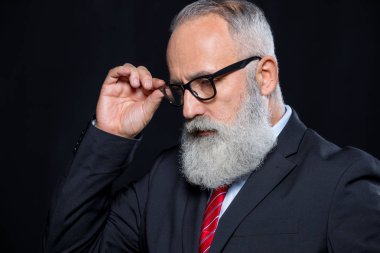 Senior businessman in eyeglasses clipart