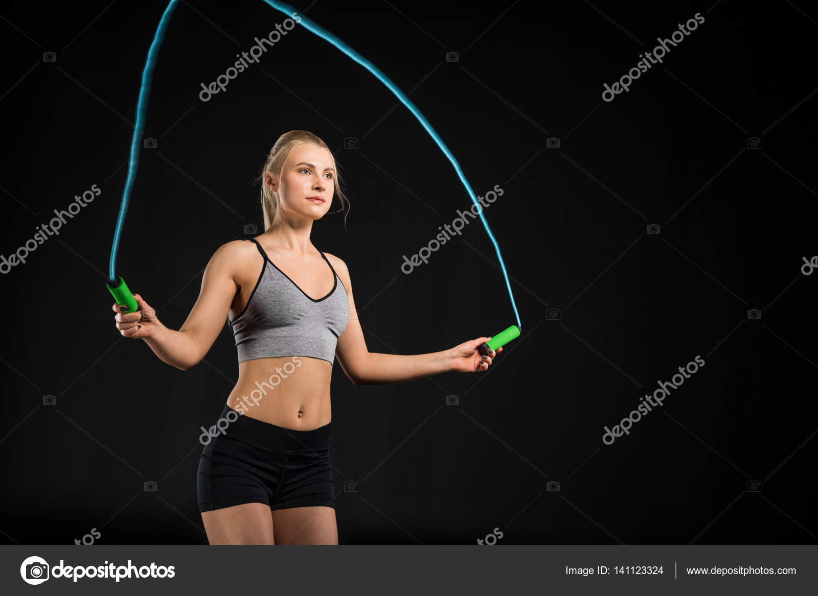 Woman with skipping rope Stock Photo by ©OlgaZakrevskaya 141123324