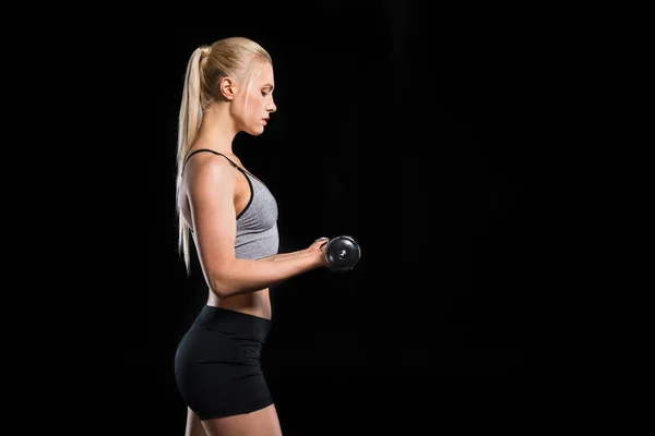 Woman exercising with dumbbells — Stock Photo, Image