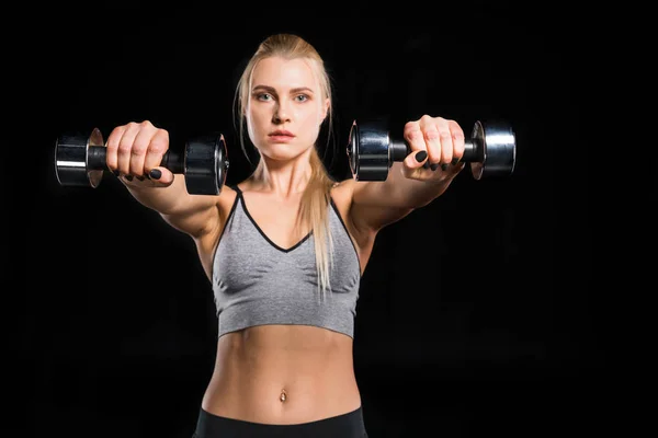 Mujer haciendo ejercicio con pesas — Foto de Stock