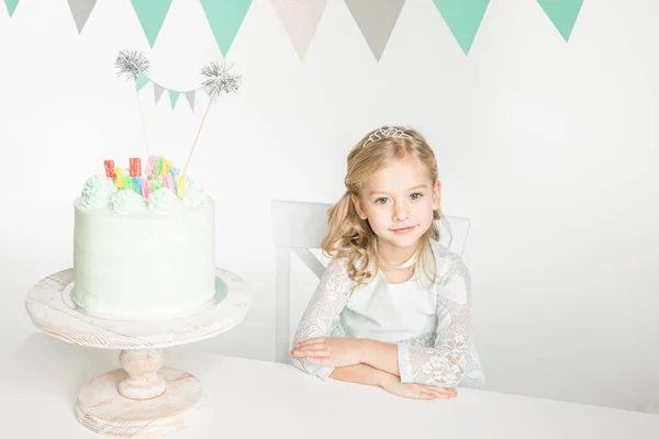 Girl with birthday cake — Stock Photo
