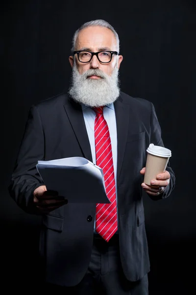 Старший бизнесмен в очках — стоковое фото