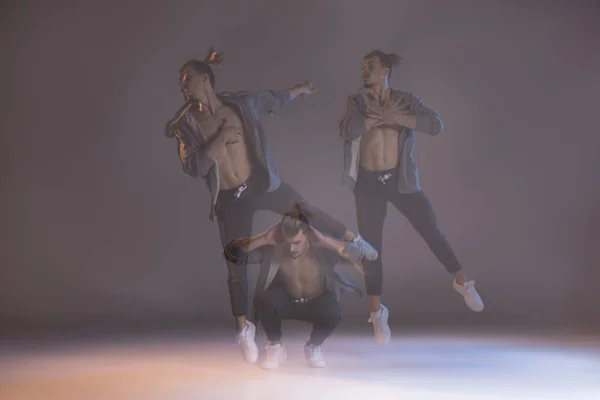 Young man dancing — Stock Photo
