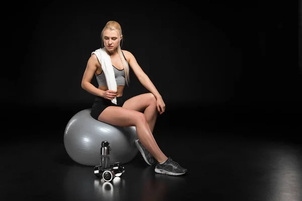 Young woman on fitness ball — Stock Photo