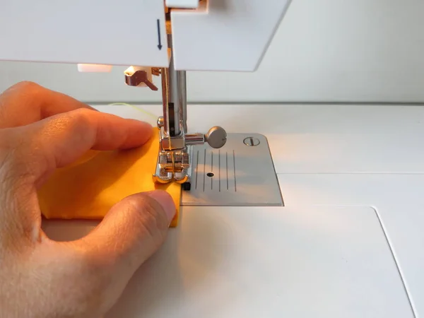 A woman sewing. — Stock Photo, Image