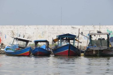 Fishing boats in Jakarta clipart