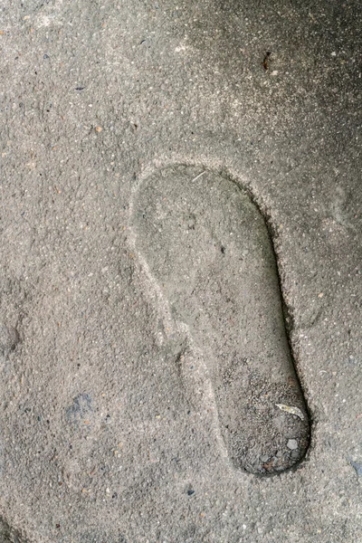 Ανθρώπινο αποτύπωμα στο τσιμεντένιο πάτωμα — Φωτογραφία Αρχείου