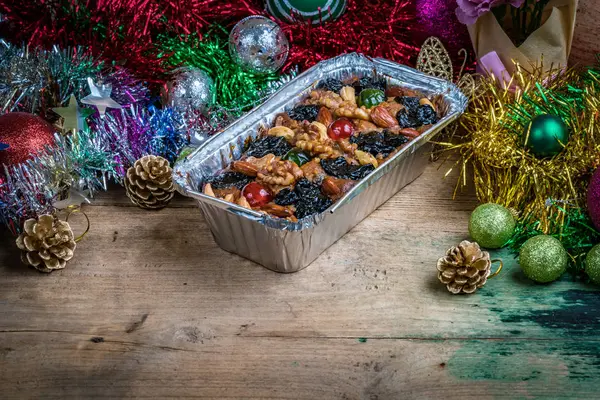 Fruit cake on wooden board — Stock Photo, Image