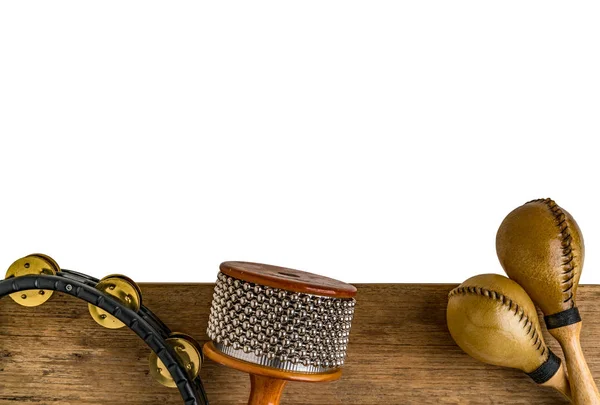 Plato plano de percusión latina sobre escritorio de madera — Foto de Stock