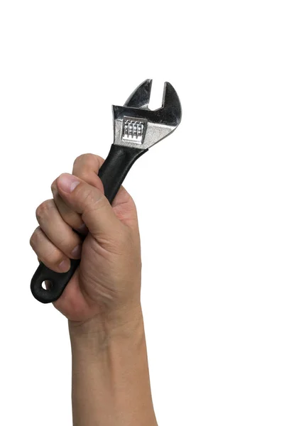 Homem mão segurando chave ajustável — Fotografia de Stock
