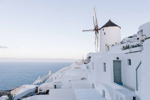 White buildings and windmill in Santorini — Stock Photo, Image