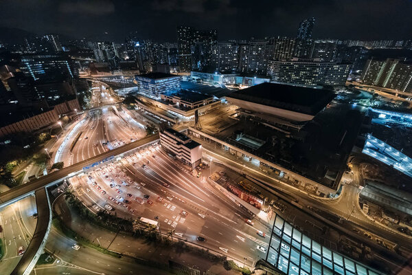 Aerial view on night in Hong Kong road with cars