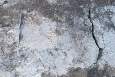 Crack in natural gray with white rock stone